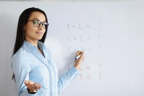 Smart tutor ask student question Stock Photos