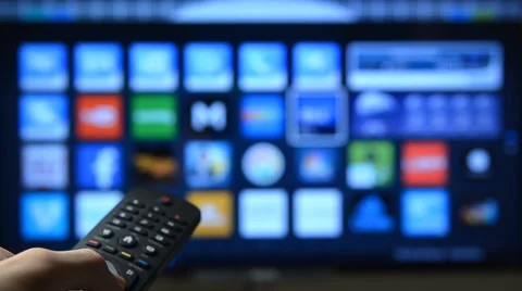 Smart tv and hand pressing remote control. Stock Footage