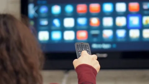 Smart tv and hand pressing remote control. 動画素材 72823202