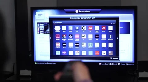 Smart tv apps and young woman hand pressing remote control Stock Footage 39907229