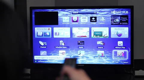 Smart tv apps and young woman hand pressing remote control Stock Footage 39907261