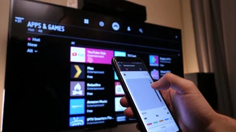 Smart TV Being Connected to a Smartphone Remote App Stock Footage 143117060