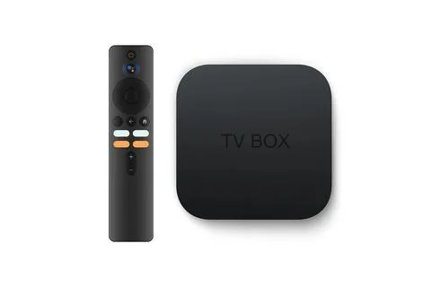 Smart tv box with remote isolated on white background Stock Photos
