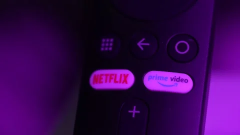 Smart Tv controller with Netflix and Prime Video buttons. Modern world's devi Stock Footage 172467037
