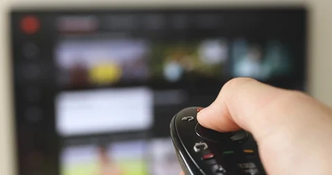 Smart tv remote control switches channels Stock Footage 123633324