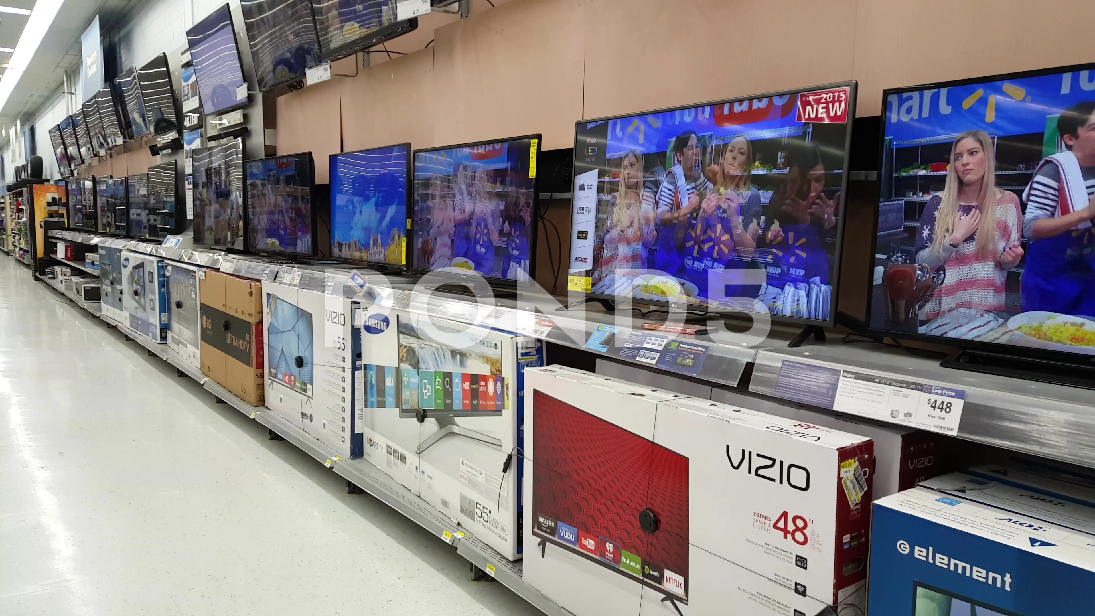 Smart TVs on display at Walmart supermar, Stock Video