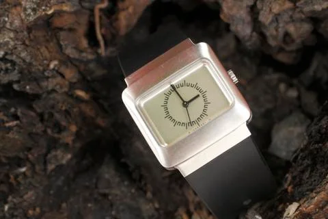 Smart watch in hole Stock Photos