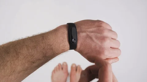 Smart watch. The man uses smart sports watches. He watches time, distance, pulse Stock-Footage 88913156