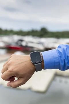 Smart watch on the man's hand. Technology and electronics Stock Photos