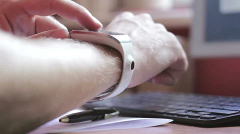Smart Watch at Office Desk Stock Footage 39849376