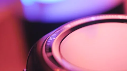 Smart watch rotates on a blurred background with colored lighting Stock Footage 187040333