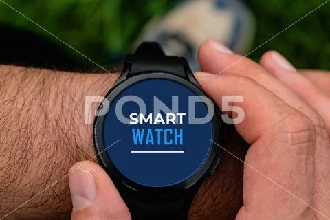 Smart watch screen mockup for advertising, man using his watch outdoors, ma.. PSD Template