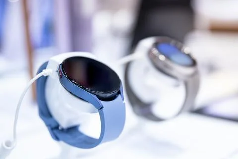 Smart watch on a showcase in an electronics and gadgets store Stock Photos