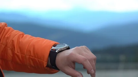 Smart watch. Smart watch on a man's hand outdoor. Stock Footage 113047416