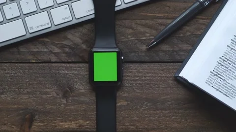 Smart watch on table Stock Footage 63379573