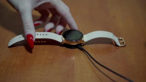 Smart watch wireless charging. Stock Footage 145513828