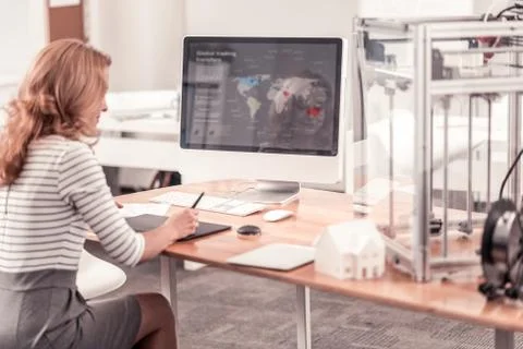 Smart woman preparing presentation for foreign partners Stock Photos