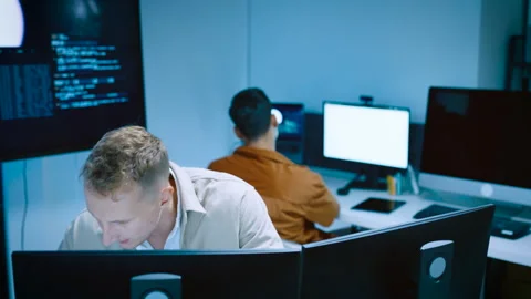 Smart young male programmer raised finger with an idea while working on com.. Stock-Footage 337038123
