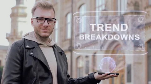 Smart young man with glasses shows a conceptual hologram Trend breakdowns Stock Footage 99593901