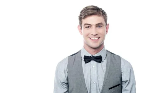 Smart young smiling man with bowtie Stock Photos