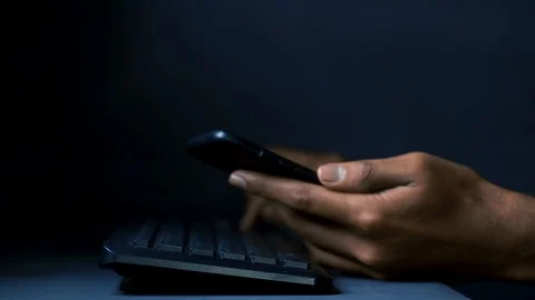 Smartphone addiction affecting at work Stock Footage 121871754