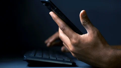 Smartphone addiction at work Stock Footage 121871197