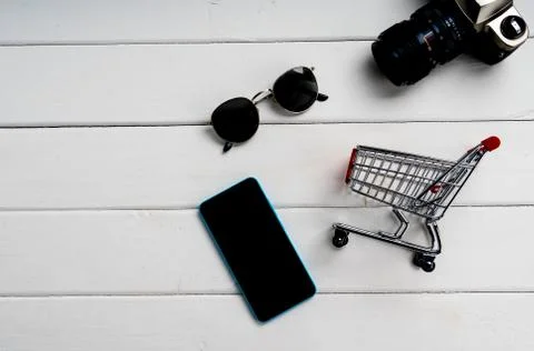 Smartphone and accessories for travel and shopping Stock Photos
