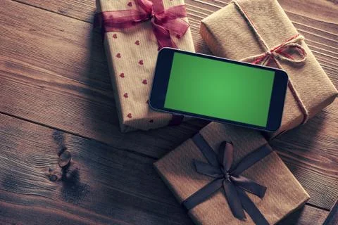 Smartphone and giftboxes Fotos de archivo