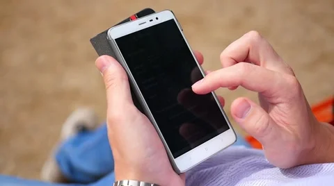Smartphone and hand control close-up 库存影片 66514319