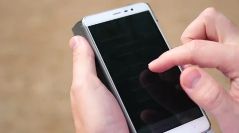 Smartphone and hand control close-up 库存影片 66514390