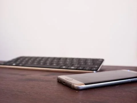 Smartphone and Keyboard Stock Photos