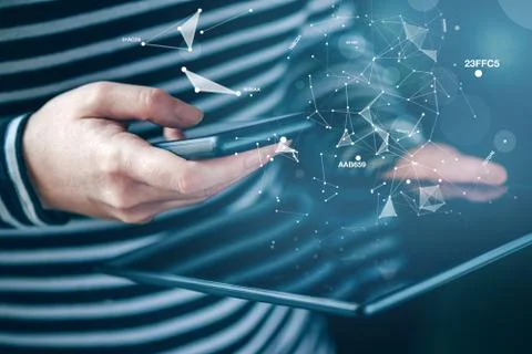 Smartphone and tablet data synchronization, woman syncing files on devices Stock Photos