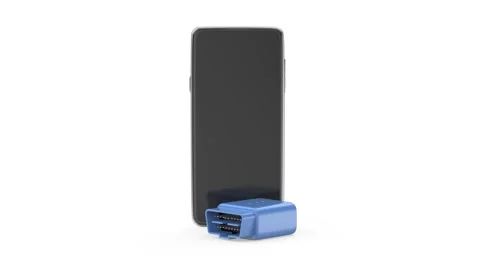 Smartphone and wireless OBD2 car diagnostic device Stock Footage 312120275