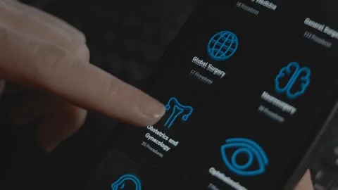 Smartphone app with a list of different specialties surgery procedures. Step by Stock Footage 253092716