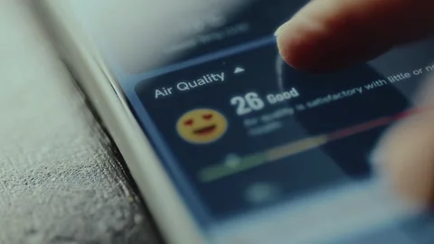 Smartphone application showing the Air Quality, status is described as good Stock Footage 327449198