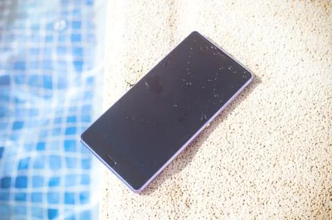 Smartphone around the pool Stock Photos