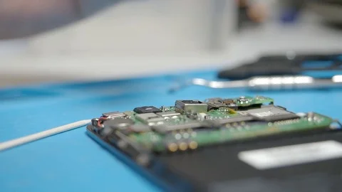 Smartphone assembling in repair shop 動画素材 113675124