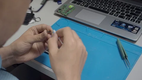 Smartphone assembling in repair shop Stock Footage 113675178