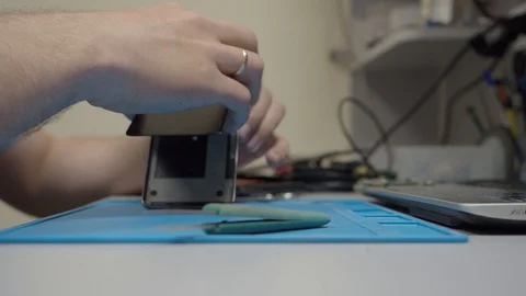 Smartphone assembling in repair shop Stock Footage 113675353