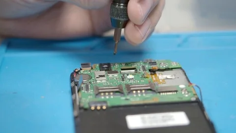Smartphone assembling in repair shop Stock Footage 113675408