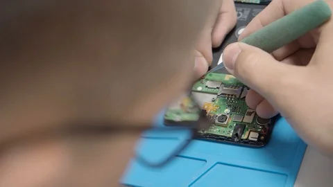 Smartphone assembling in repair shop Stock Footage 113675419