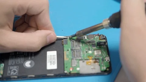 Smartphone assembling in repair shop 動画素材 113675513