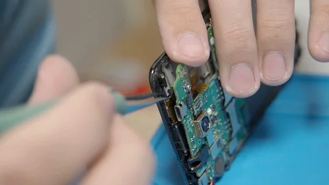 Smartphone assembling in repair shop Stock Footage 113675547