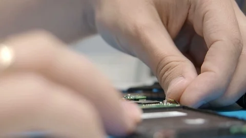 Smartphone assembling in repair shop Stock Footage 113675586