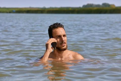 Smartphone at the beach Stock Photos