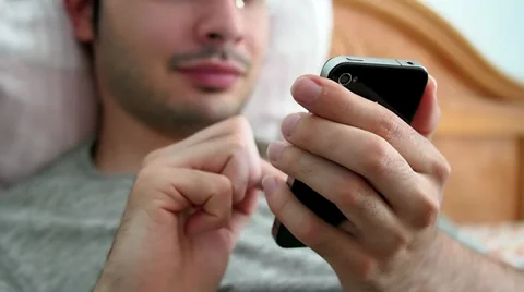 Smartphone In Bed Stock Footage 27249495