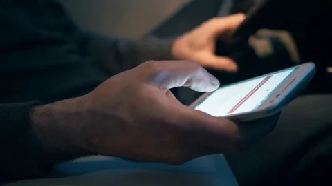 Smartphone Being Used By Driver While Driving Nighttime Stock Footage 75960848
