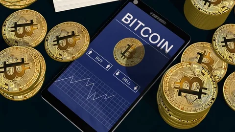 Smartphone with Bitcoin chart on-screen Bitcoin trading Stock Footage 102024350