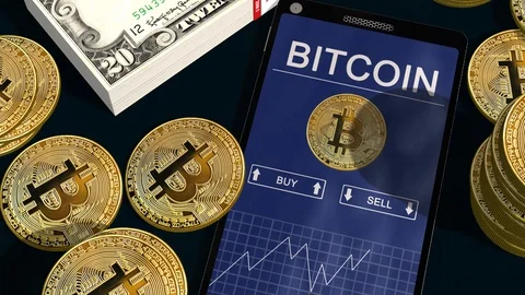 Smartphone with Bitcoin chart on-screen Bitcoin trading Stock Footage 102031634