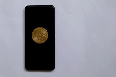 Smartphone with bitcoin display Stock Photos